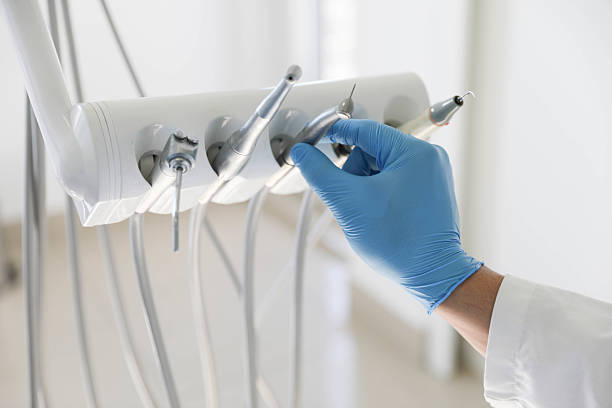 Professional Tooth Extraction technician working in Burley, WA